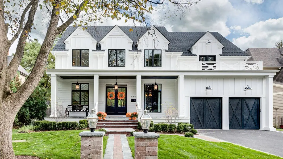 Modern home with white James Hardie fiber cement board siding and black trim
