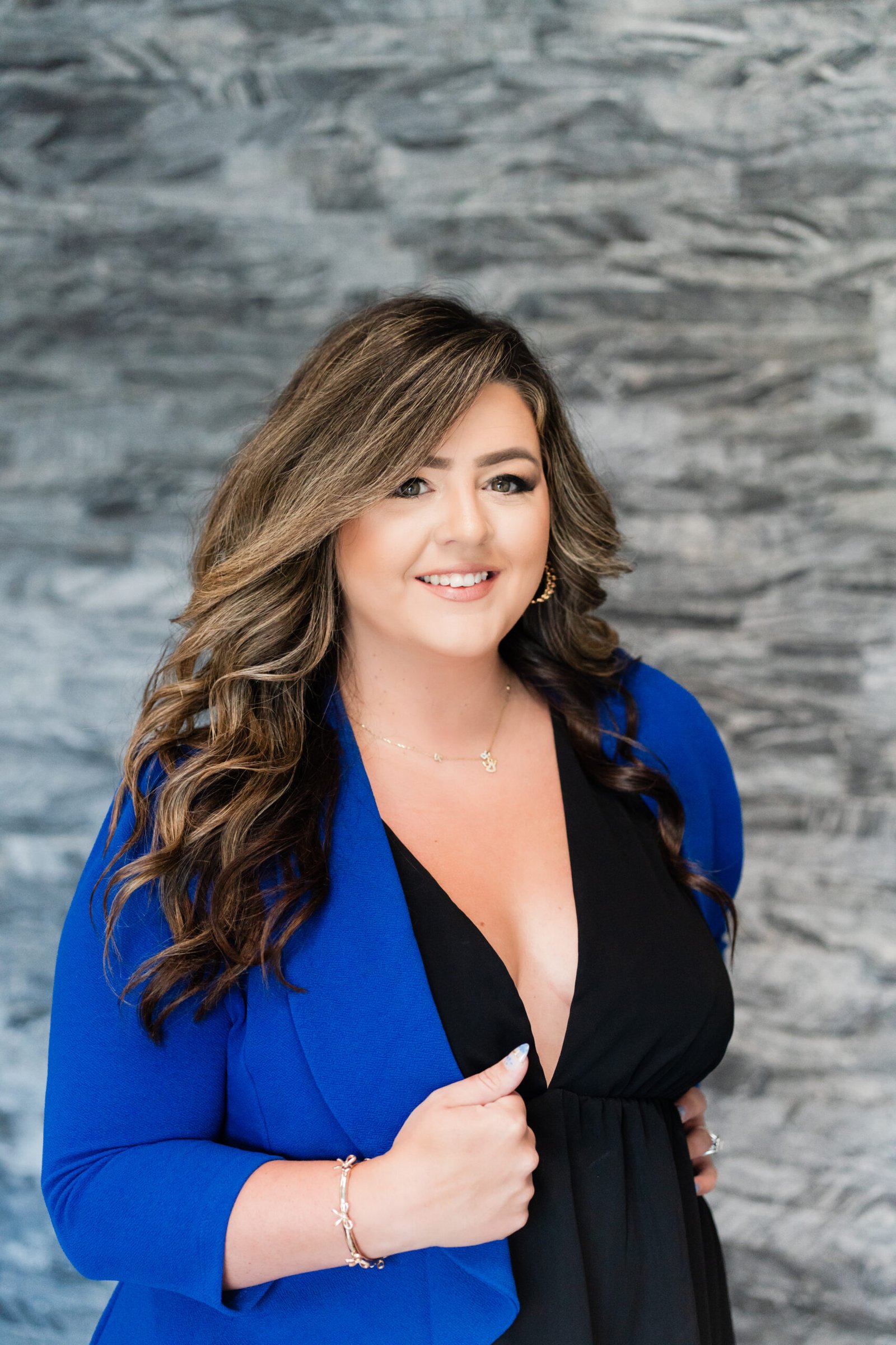 Co-owner and CEO of Smithrock Roofing, leading office operations and business strategy