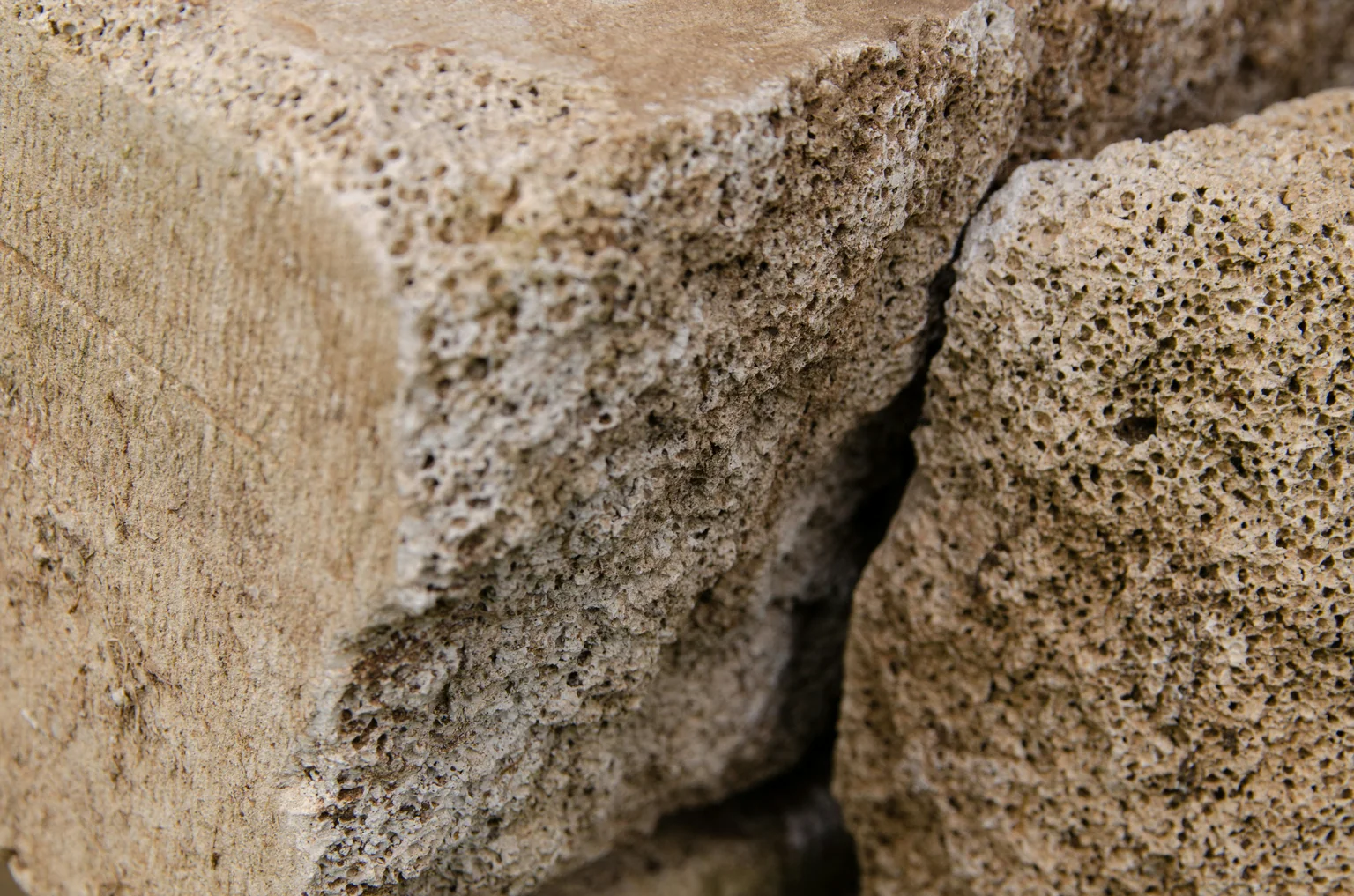 close-up of manufactured stone veneer texture - stone veneer and vinyl siding close-up of manufactured stone veneer texture - stone veneer and vinyl siding
